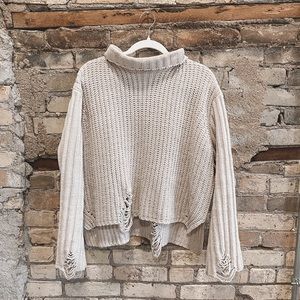 Distressed sweater